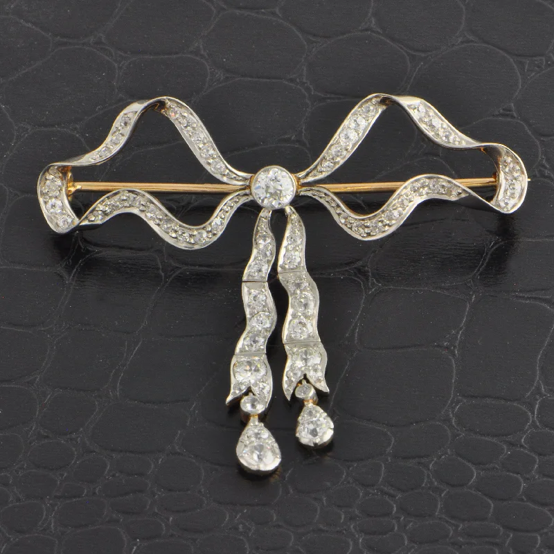 Antique Edwardian Diamond Bow Brooch in 18k Yellow Gold and Platinum