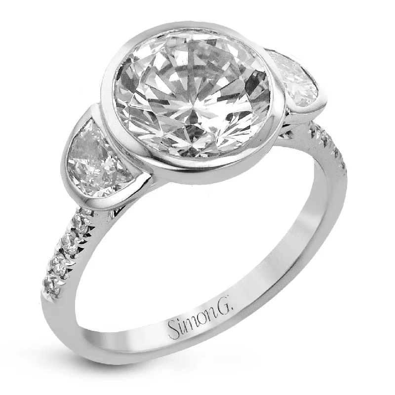 Accessorize For Less – Luxury Jewelry At Affordable Prices Round-cut Three-stone Engagement Ring in 18k Gold with Diamonds