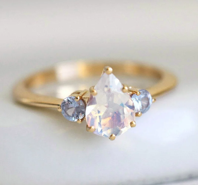 Pear Rainbow Moonstone Ring With Light Blue Sapphires