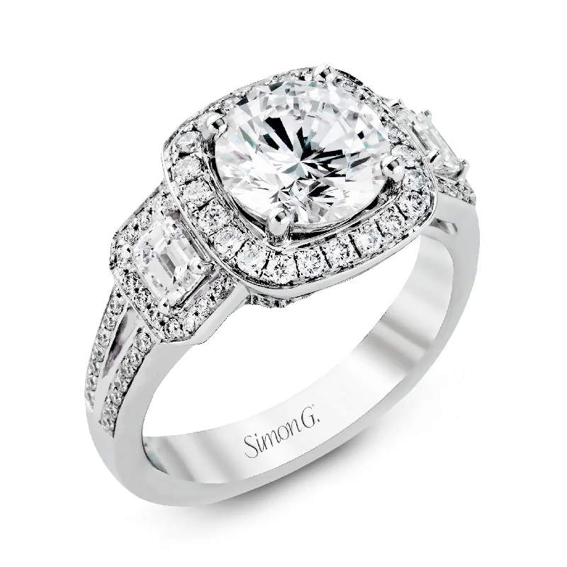 Grab Exquisite Jewelry At The Lowest Prices Round-cut Three-Stone Halo Engagement Ring in 18k Gold with Diamonds