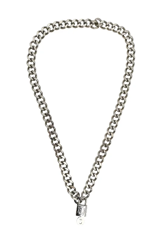 Stunning Jewelry Pieces At The Lowest Prices Ever CHRISTIAN DIOR Sterling silver logo-embossed padlock chainlink necklace
