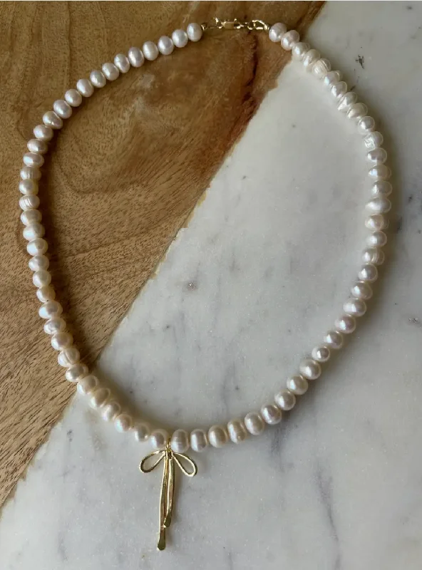 Pearl Bow Necklace by Jessica Matrasko Jewelry