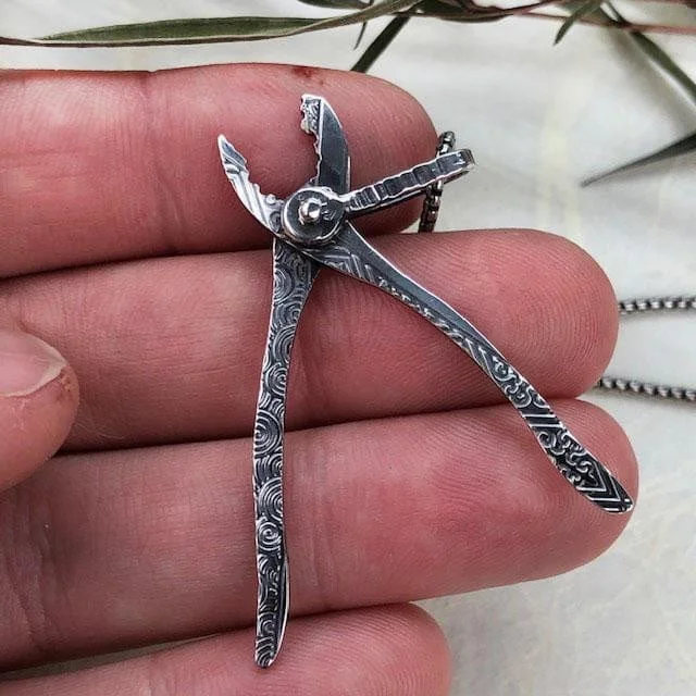 Bestselling Jewelry At Special Promotional Rates Ornate Plier Pendant in Silver